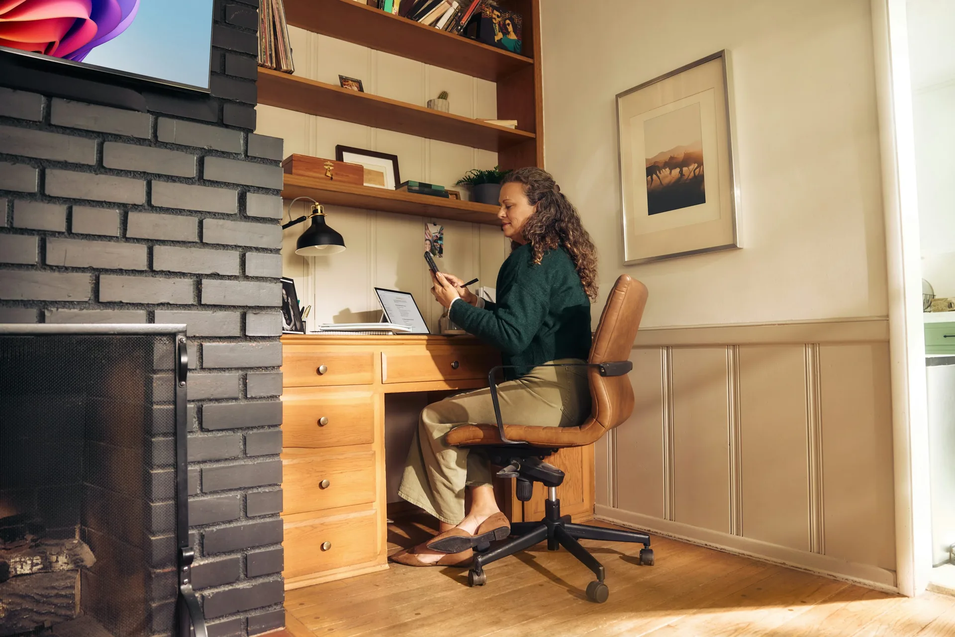 Small business owner working from a bright home office
